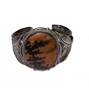Vintage Navajo Sterling Silver Cuff Bracelet with Petrified Wood Fossil Design
